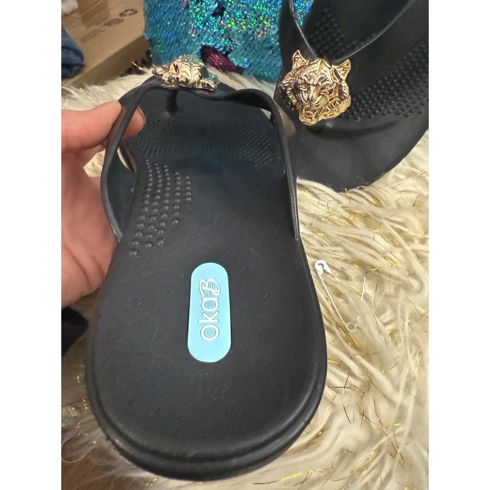 New Okab Black Licorice Gold Lion Head Rubber Flip Flop Thong Sandals Womens M/L